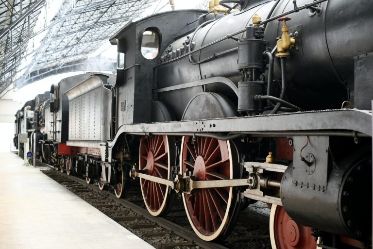 Old locomotive standing at railway station